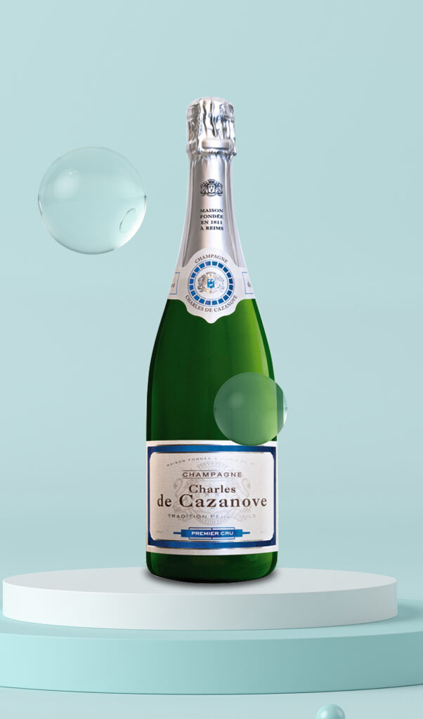 bouteille de champagne Charles de Cazanove Premier Cru posée sur socle / bottle of Charles de Cazanove Premier Cru champagne on a pedestal